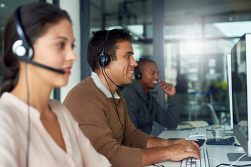 Poster - Striking sales one after another. Shot of call centre agents working in an office.