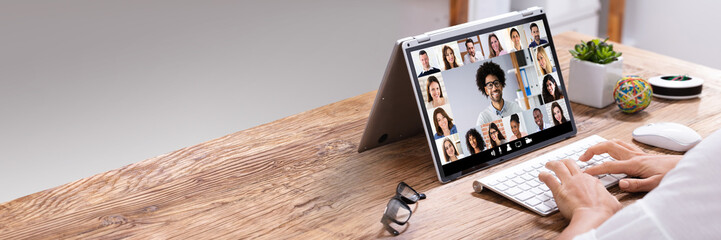 Poster - Businesswoman Video Conferencing With His Colleagues On Laptop