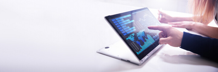 Poster - Businessman's Hand Pointing Bar Graph On Laptop