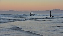 Landscape With A Beautiful Sunrise Over The Beach In Strand And The False Bay