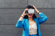 © Dani D.G - Content woman in VR headset
