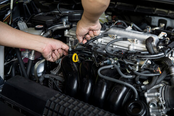 Wall Mural - Man use Open-ended wrench for basic car repairs by yourself in engine room , car service concept