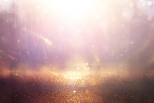 Background Of Abstract Gold, Pink, Purple And Silver Glitter Lights. Defocused