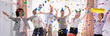 Excited Businesspeople Having Fun Raising Their Arms