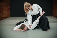 A Man And A Woman Practice Aikido Indoor