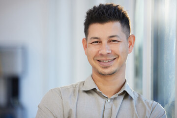 Aufkleber - Im always ready for success. Shot of a handsome young businessman standing alone in his office during the day.