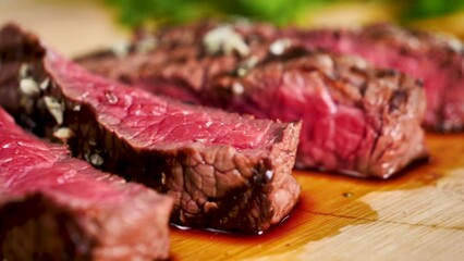 Poster - bloody beef steak slices on wooden board