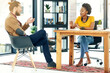 © AS/peopleimages.com - Bringing some fresh ideas to the table. Shot of young creatives having a discussion in a modern office.