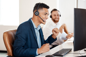 Poster - Wow, I cant believe my luck. Shot of a young call centre agent cheering while working in an office.