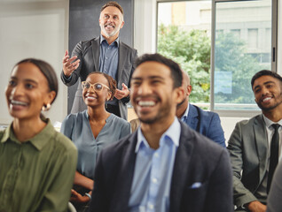 Poster - They always enjoy his presentations. Shot of a group of businesspeople having a meeting in a boardroom at work.