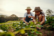 © Lyndon Stratford/peopleimages.com - Shes getting some hands on education. Low angle shot of a handsome man and his young daughter working the fields on their farm.