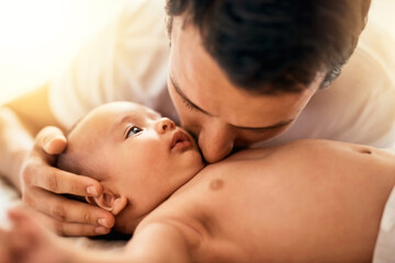 Poster - You are loved my little one. Shot of a father bonding with his baby boy at home.