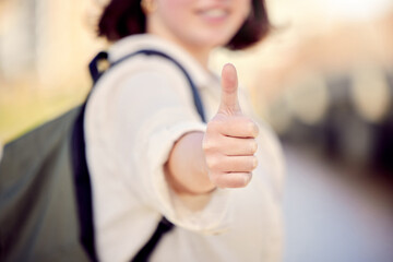 Poster - Do good and youll attract good. Cropped shot of a woman showing thumbs up while standing outside.