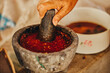 Preparation of red sauce in molcajete. Mexican sauce. Macha sauce. Mexican spicy.