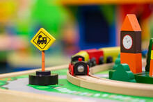Train Toy With Track And Traffic Sign Running Over City Toy Pass The Clock Tower
