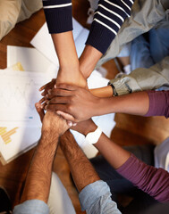 Poster - Weve got this. High angle shot of a group of people joining their hands together.
