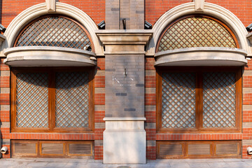 Wall Mural - Vintage red brick wall and wood window outdoor background