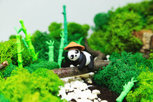 Funny Homemade Plasticine Panda In A Stylized Jungle.