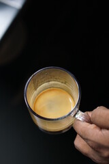 A delicious coffee extract brewed by a barista at a cafe