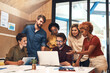© Ruan J/peopleimages.com - Getting everyone on the same page. Shot of a diverse group of businesspeople working together on a laptop in an office.