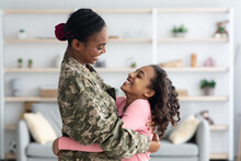 Loving Black Mother Soldier Bonding With Her Cute Daughter