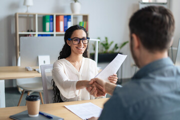Poster - Smiling female personnel manager and job applicant shaking hands after successful employment interview at office