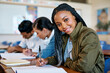 © Katleho Seisa/peopleimages.com - Doing it for my future. Cropped portrait of an attractive young university student taking notes while sitting in class.