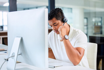 Poster - I can hear your clearly, sir. Shot of a handsome young businessman sitting alone in his office and wearing a headset while using his computer.
