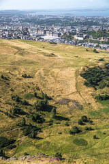 Sticker - Scotland, Edinburgh.  Holyrood park and ancient volcano. Beautiful panoramic view City of Edinburgh  from the mountain