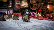© Esther - Low angle image of a brass d20