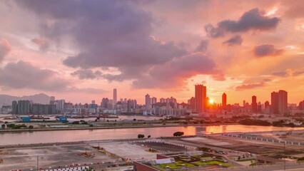 Wall Mural - Top view of sunset in Hong Kong from kowloon bay downtown timelapse