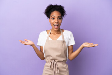 Sticker - Restaurant waiter latin woman isolated on purple background with shocked facial expression