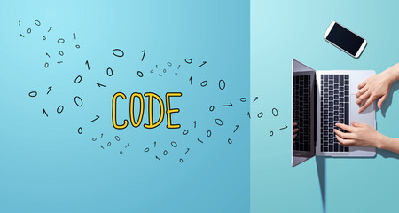 code with person working with a laptop