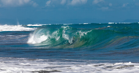 Ocean Wave Closeup Water. Ocean wave closeup detail of upright crashing hollow breaking water. energy power of nature.