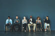 © T Chithambo/peopleimages.com - Do what you must to be prepared. Shot of a group of well-dressed business people seated in line while waiting to be interview.