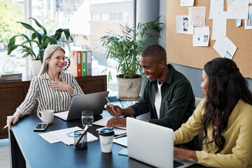 Poster - Like a thief it takes time to be this great. Shot of a group of businesspeople brainstorming and using a laptop in a modern office.