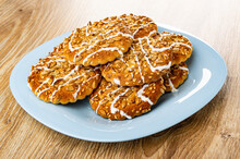 Cookies With Glaze, Sunflower Seeds And Sesame In Plate On Table