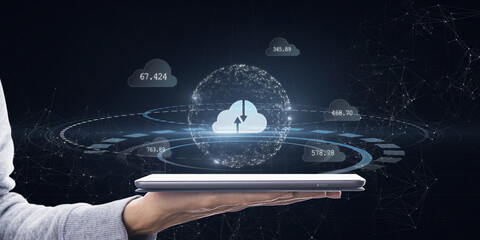 Leinwandbilder - Close up of hand holding tablet with creative polygonal digital cloud on blurry background. Cloud computing, wireframe network concept. Double exposure.