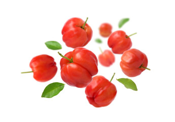 Acerola cherry with leaves  levitate isolated on white background.