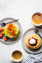 Canvas Print - Breakfast with waffles and coffee, top view. Different toppings for sandwiches - ice cream and vegetables.