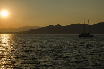 Evia island, Greece - July 01. 2020: Sunset on the island of Evia, Greece.