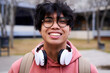 © CarlosBarquero - Close up shot of cheerful happy asian teenage boy looking at camera smiling. Intense look of a young man.