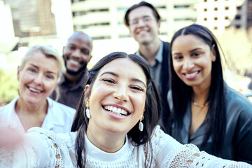 Poster - I find the harder we work, the more we have. Shot of a group of business colleagues taking selfies outside.