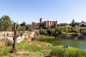 Wall Mural - Buitrago del Lozoya, Spain. Views of the Old Town walls and the Puente del Arrabal bridge from the Andarrio suburb