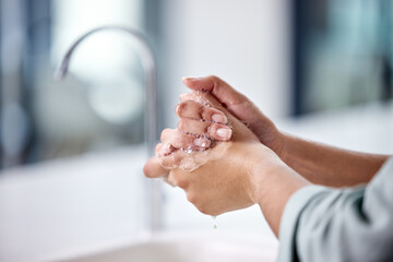 Wall Mural - Keep yourself and others safe. Shot of a woman washing her hands in the sink.