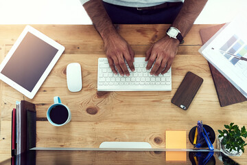 Aufkleber - Fingers on the keyboard. High angle shot of an unrecognizable businessman working in his office.