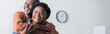 © LIGHTFIELD STUDIOS - happy and senior african american man embracing smiling wife, banner.