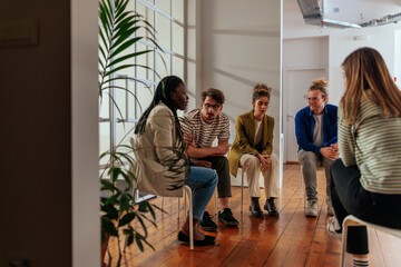 Wall Mural - Support group gathering for a meeting