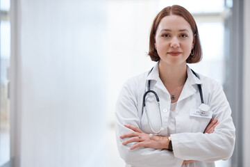 Poster - Loving what I do more everyday. Shot of a beautiful young doctor in the hospital.
