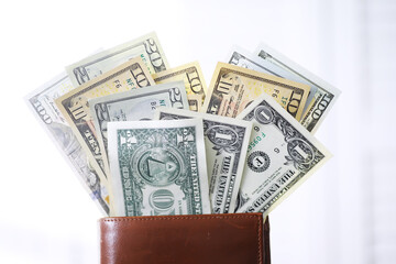 Group of money stack of 100 US dollars banknotes a lot of the background texture. Cash money in a large pile as a finance background.